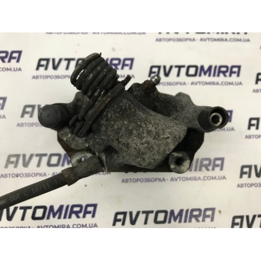 Суппорт тормозной задний правый Ford Focus 3 2011-2017 8M512M088